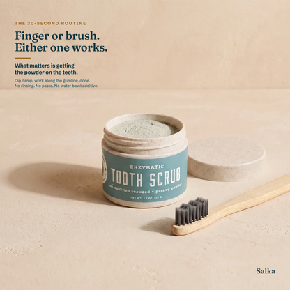Apply SalkaPet dog tooth scrub with a finger or a toothbrush