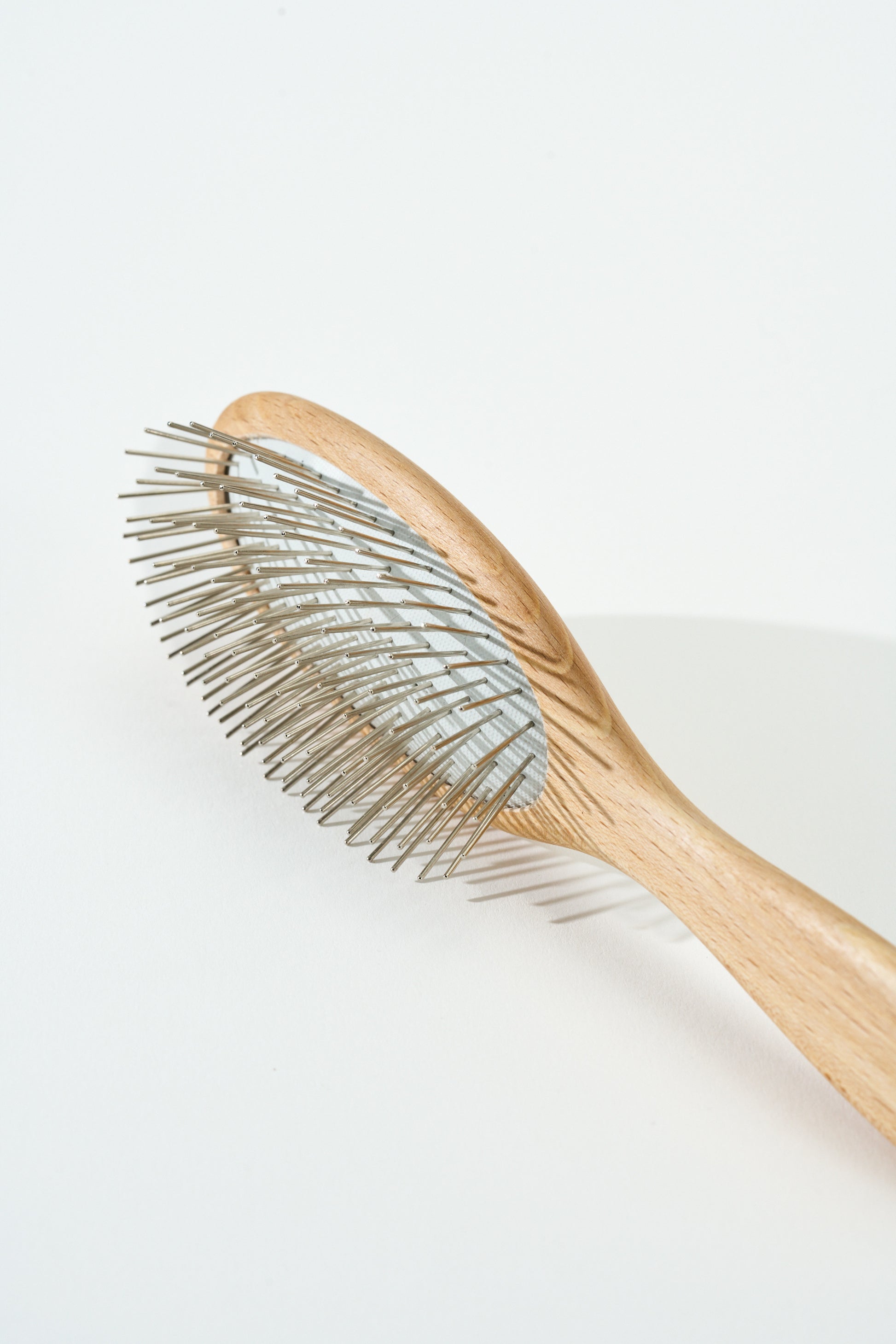 SalkaPet natural wood paddle dog brush — fine metal pins for daily detangling